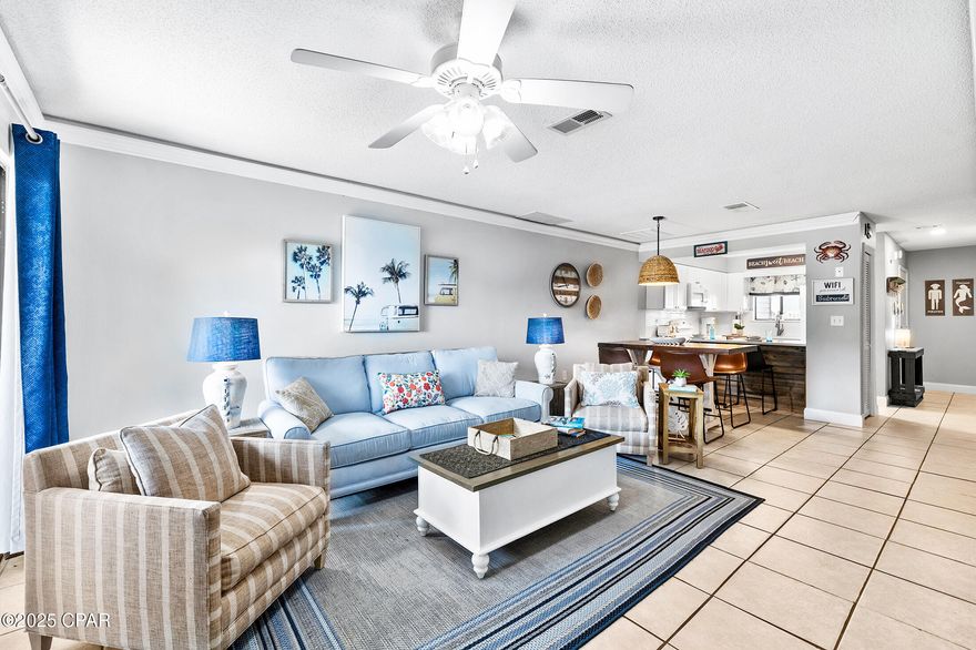 Live the Beach Lifestyle at Portside in Panama City Beach!
Welcome to this beautifully updated 2-bedroom, 1.5-bath condo where coastal charm meets modern comfort. Inside, you'll find Quartz kitchen countertops, hardwood stairs, LVP flooring upstairs, oversized closets, and bathrooms featuring stylish shiplap accents and an updated vanity space - plus brand-new bedroom furniture. This ''Super Nautical'' retreat is thoughtfully designed for easy, breezy, turnkey beach living.

Whether you're looking for a full-time residence, a second home, or a proven vacation rental investment, this condo offers incredible flexibility. Enjoy resort-style amenities including multiple swimming pools, a fitness center, and convenient beach access, all in one of the most desirable locations in PCB.

Step outside and you're minutes from it all — Topgolf, Pier Park, the SkyWheel, and Dolly Parton's Pirate's Voyage. Beach access is right across the street, with Pier Park just 8 minutes east and 30A only 15 minutes west. From shopping and dining to nightlife and entertainment, everything you love about Panama City Beach is right at your fingertips.