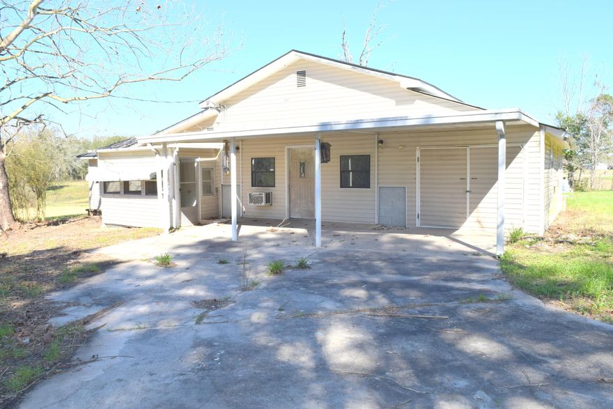 Great investment opportunity with this 2-bedroom, 1.5 bath home. With a little TLC this country cottage could have endless possibilities, features include a large bonus room that could be converted to a third bedroom, formal dining room, living room and attached garage. Property is located approximately 7 miles from Bonifay city limits on spacious 1.4 acre lot.