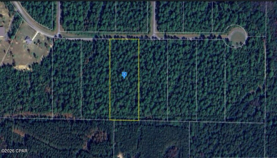 4.02-acre vacant lot on Cypress Crossing Rd in Vernon, Washington County. Quiet, wooded parcel in a gated community with paved road access.
