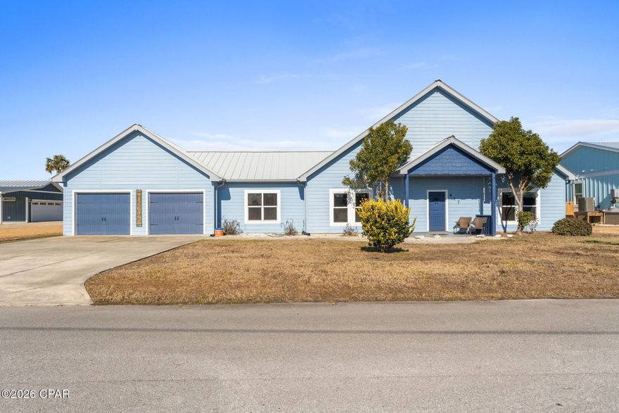 Welcome to your dream beach house! This stunning 4-bedroom, 3.5-bathroom home combines exceptional craftsmanship with quality features, offering the perfect balance of relaxation and entertainment. Owned and updated by the original builder, this property boasts high-quality construction and finishes throughout. Less than half a mile from the beach, this home is perfect for coastal living. Multiple living areas and three separate wings provide privacy and versatility, while the heated and cooled additions make this home truly unique. One addition features an indoor bar and game room, perfect for year-round entertainment. Another offers a Florida room living area, a bedroom, and a bathroom, which can be closed off for privacy ideal for guests or multi-generational living. The backyard is an entertainer's paradise. Enjoy the serene pond views from the large backyard, which includes an outdoor bar, and plenty of space for gatherings. Whether you're hosting or relaxing, this home's thoughtful design and amenities make it a coastal retreat like no other. Great for a vacation rental or personal residence, offering great versatility as a property. The home is perfectly suited for entertaining and enjoying the beauty of beachside living!