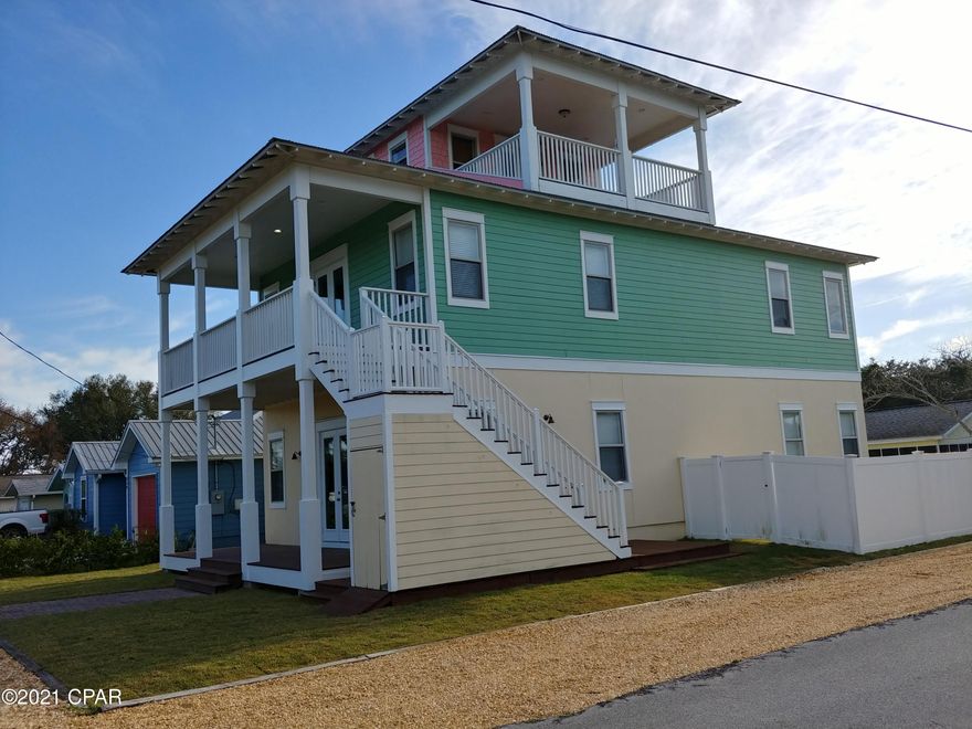 UNDER  CONTRACT SELLER TAKING BACK UP OFFERS . Like New home with complete living areas on both Levels. Perfect for Guest or a Mother in Law situation. 

Currently the family used 1 floor and rented out the bottom to Long Term Tenants.

 Just keep it as 1 large Home, 2 complete kitchens 1 on the 1st floor and 1 on the 2nd floor..

The 3rd story is a Lovely Open room with Great Gulf views .Use it as an office/sewing room/ Or a ''Cocktail room'' Off of this room is a large covered deck where you can enjoy the breeze and enjoy Gulf Views.

Stainless Appliances in both kitchens, Laminate flooring  and 10' Ceilings 

Lots of room for you and your friends and or family .Corner location with ample parking plus a fenced in rear yard.

Take the short 3 block walk to Beautiful Bid a Wee Beach  PRIVATE access Gates. Enjoy a walk on the Beautiful sandy beach where there are No Motels or Condos to obstruct your view !
Over 2200' of Beach to enjoy. Stop-relax-and listen to the Waves Roll in.