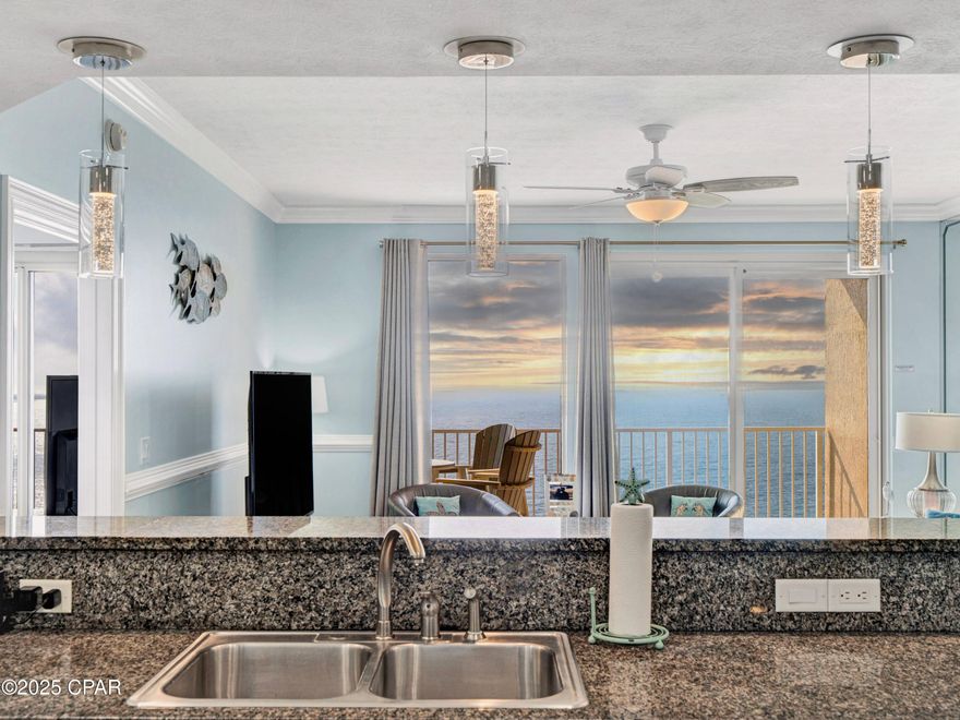 Penthouse Perfection at Treasure Island in East PCB! In a market where condo financials are often the biggest question mark, Treasure Island offers a rare level of confidence. This complex stands out with fully-funded reserves, passed inspections, and a track record of ZERO special assessments in at least the five years of the seller's ownership. The association just had an HOA dues DECREASE as a result of the fantastic management and recent insurance reduction. Additionally, new high-speed elevator installation is underway and the cost is already fully covered by the current budget. This isn't just a condo; it is an investment that makes as much sense on a spreadsheet as it does in your heart :)  

As you enter, you'll encounter a fully revitalized interior that is ready for immediate enjoyment. The unit shines with fresh paint and brand-new coastal furnishings that perfectly capture the relaxed beach atmosphere. You will appreciate the durability and cleanliness of having tile flooring throughout (no carpet!). It has been a pet-friendly unit but it's so clean you wouldn't even know it. The bathrooms have been updated with stylish new vanities and even have special pull knobs to accent the beachy vibe. There are built-in bunks behind the dining area that have cute porthole decor and give the unit more sleeping space in addition to the two spacious bedrooms. The kitchen features a new white refrigerator and built-in microwave. Plus there's a new washer/dryer and HVAC system for year-round comfort and peace of mind.

The current owners have been incredibly happy with the complex, praising the onsite rental management and the proactive Board of Directors for making ownership easy and profitable. It is a proven performer, grossing $45k in rental income in 2025. It has potential to be even stronger, but the owners have wanted to enjoy the unit themselves as well. And who could blame them with a unit like this! 

The complex is pet-friendly for owners and also allows renters to bring one dog under 30lbs, a rare feature that significantly boosts rental demand. Complete with an assigned covered parking spot and located next to Schooners Restaurant on one side and St. Andrews State Park on the other, this is the total package. Whether you are looking for a primary residence, vacation getaway, or a high-performing investment, this penthouse is ready for you. Schedule your showing today - a video tour is also available