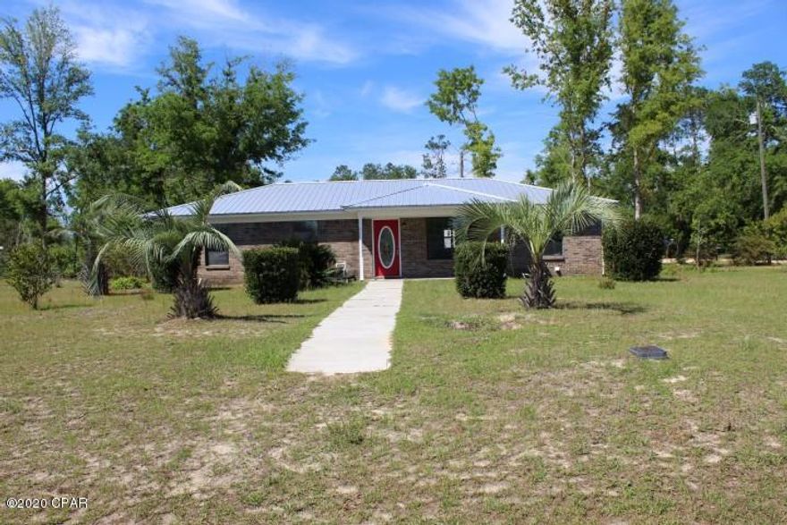 Very nice home on quiet street and close to town. This home has a new tin roof, new counter tops, new vinyl plank flooring throughout, new stainless steel appliances, new garage door motor, new toilets, new door knobs and hinges, and a new back door too. Freshly painted throughout and boasts an open floor plan. This cute home offers 1,325 sq. ft. of space, to include 3 BR's, 2 baths, spacious combination kitchen/dining/living room and a one car garage