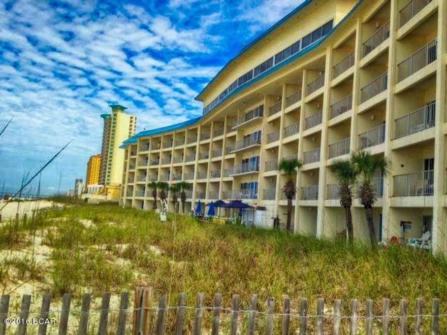 Rare...don't miss your chance at affordable Gulf front living under $100,000! This studio efficiency features a full kitchen, full bath, two full sized beds, a sofa, dining table, and accommodates a family of four! Fantastic sunsets from your private Gulf front balcony. Bonus $2500 flooring allowance to make it your own. Prime location only a short walk to the City Pier, Pier Park, theaters, dining, shopping, family recreation, across the street from Gulf World, and only 18 minutes gate to door from the airport. Amenities include a seasonally heated pool, Tiki snack bar, lounge/game room with pool tables and kitchen, laundry, 24 hour security, onsite rental management and covered parking. Additional monthly fees $15 phone, $20 cable, $16 Wi-Fi, security $20, utilities $99.67 base rate plus $2.99 per day of occupancy. Optional TV lease at $10 per month.

ALL INFORMATION CONTAINED HEREIN IS DEEMED RELIABLE, BUT NOT GUARANTEED. SUBJECT TO ERRORS, OMISSIONS, PRIOR SALE, CHANGES OR WITHDRAWALS WITHOUT NOTICE.