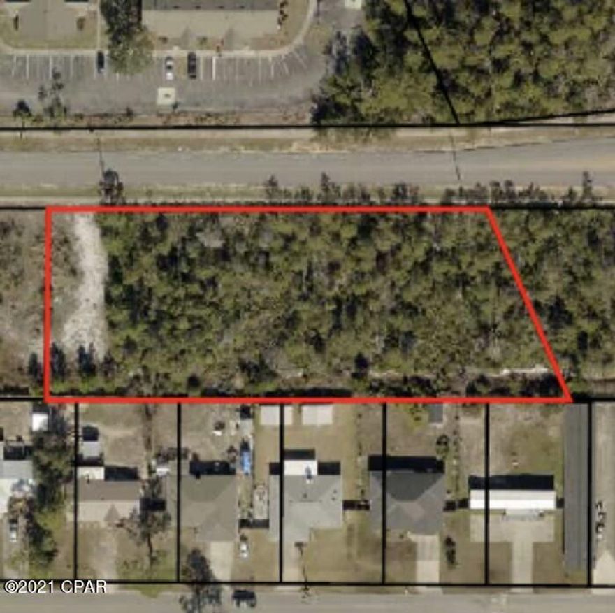 Just hitting the market, property for sale at 7061 Patronis Drive, Panama City, FL, USA. This property is adjacent to another property for sale at the same price.  Each parcel has been approved for 10 townhomes each.  The price is the same for each.  $460K ea.  It comes with a Development Order and approved plans by the

planning division.  It's zoned commercial for townhomes. We have the addresses for each townhome.  Most of the land on the other property and some of this property has been cleared.  There is city water and sewage which is hard to find in the county.  Little one can go to the school just down the street.  Very close to the Navy base.  Seller is willing to do some financing.  Seller is a retired developer from Panama City Beach and can help.  Pricing for developmental costs will be available.