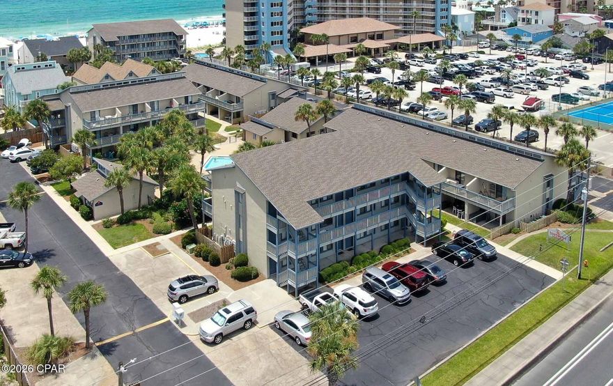 Unlock the full potential of your beach getaway in this exceptional Panama City Beach ground floor retreat, boasting a thoughtfully designed condo that seamlessly blends comfort and effortless living on the East end of the beach. This outstanding condo features tile flooring throughout, a fully furnished livingroom, kitchen, bedroom with a king-size bed and a patio overlooking the pool area, just steps from the pristine white sandy beachs and breathtaking sunsets.