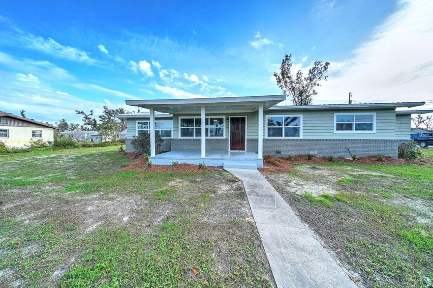 'CURRENTLY UNDER CONTRACT, SELLER ACCEPTING BACKUP OFFERS' MOTIVATED SELLER!!!! Newly Remodeled Home! This 4 bedroom home sits on almost a half acre and is move in ready! Renovation includes NEW- Roof, windows throughout, paint inside and out, appliances, kitchen cabinets, granite countertops, tile flooring, lighting, bathroom vanities, toilets, plumbing, refinished hardwood floors and so much more! Huge carport utility room for storage and covered parking. Convenient to Tyndall AFB, shopping and schools. Call your agent for a showing today!