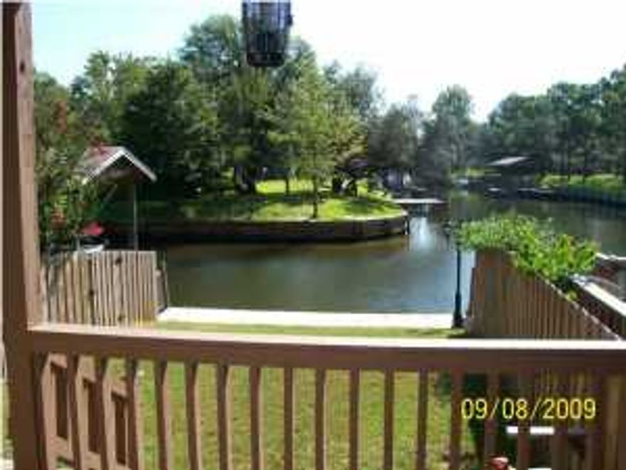 TOWNHOME IS LOCATED WHERE TWO CANALS LEAD TO THE BAY. TOWNHOME INCLUDES A RECENTLY ADDED SEAWALL AND DOCK. THE HOME HAS A PRIVACY FENCED COURTYARD IN THE FRONT OF THE HOME. THERE IS ALSO A IN THE MASTER BEDROOM WITH A BEAUTIFUL VIEW OF THE WATER. THIS HOME IS A MUST SEE!