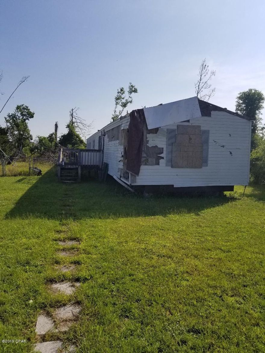 Home has extensive damage on front end from Hurricane Michael.  SOLD AS-IS AND CASH ONLY.  Seller said always rented until storm.  Rent was $750 / mth.  PLEASE VERIFY ALL INFORMATION AND MEASUREMENTS.....Drastic Price Reduction, Owner said get it sold!!



SELLER HAS NO KNOWLEDGE OF CONDITION.