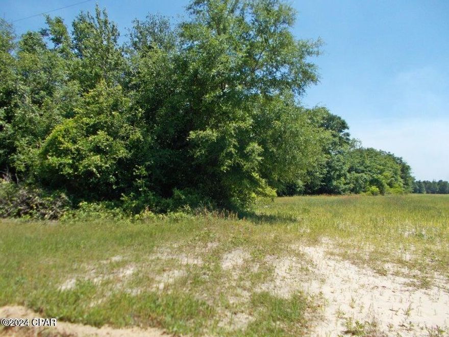 Nice cleared land outside of town, Bring your mobile home or build on this cleared level property.