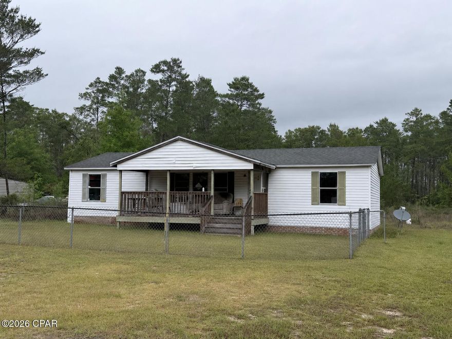 Enjoy 3 acres of spacious land in Southport Florida. The manufactured home that sits on the property is a three bedroom two bath home. Perfect for investors looking to put a little TLC into this property to make yours. For more details contact listing agent. Some photos may include virtual staging or AI enhancement.