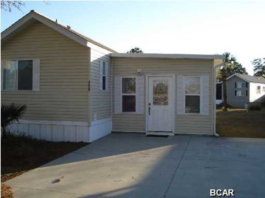 For rent. This 2 bedroom, 2 bathroom beach home is located in the gated community of Emerald Pointe Resort. Conveniently located on Thomas Drive and right across the street from the Navy base. The resort has two pools, exercise room, clubhouse and playground. Ready for immediate occupancy, this unfurnished home has been updated with new flooring and has a large add-on living room. Washer/dryer included. Rent includes water/sewer, basic cable and garbage. **Pets negotiable with $250 non-refundable pet fee** Please call us today for your showing!