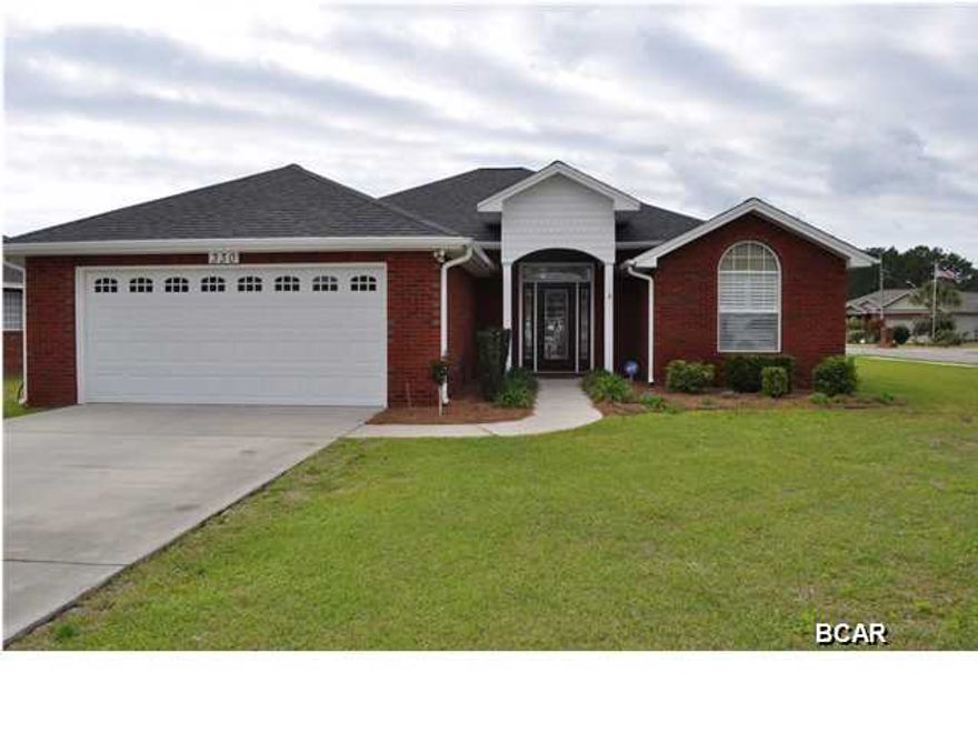 Stunning 3 bedroom, 2 bath home in the popular Forest Walk subdivision, just minutes from Tyndall Air Force base. This house is teeming with curb appeal and pride of ownership shows everywhere you look. The interior boasts 10 ceilings, crown moulding, wood laminate floors, wraparound high shelving in living room with surround sound, and an open-floor/split-bedroom floor plan. In the kitchen, the sellers recently added a decorative glass tile backsplash to compliment the quartz counter tops and Tuscan style cabinets. Additional kitchen highlights include stainless steel appliances and a roomy walk-in pantry. The spacious Master Suite features a tray ceiling and a bedroom sized walk-in closet while the private en suite is comprised of a whirlpool tub, tile shower and double sinks with