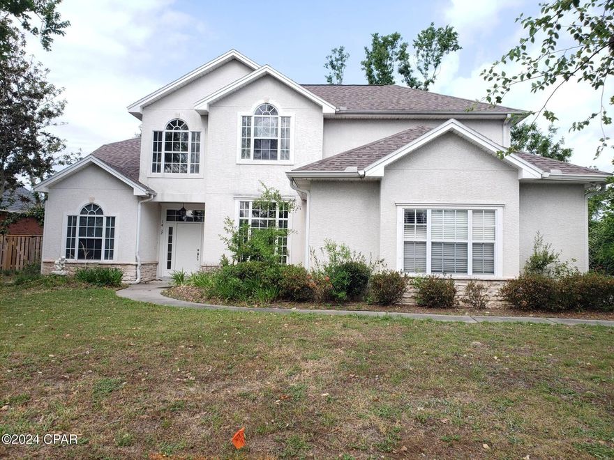 Welcome to this beautiful, custom-built home in the established and coveted MOWAT HIGHLANDS in Lynn Haven, FL!

This stunning residence boasts four spacious bedrooms and 3.5 bathrooms, including a first-floor master suite with an exceptional ensuite!

The home's design is a perfect blend of comfort and elegance, featuring a gas fireplace and ceiling fans for year-round comfort. The entertainer's kitchen, complete with a breakfast bar, is a dream for those who love to cook and host. The large laundry room is equipped with a sink for added convenience!

The home also includes a two-car garage, providing ample space for vehicles or additional storage. Outside, you'll find a partially covered and screened back deck, perfect for outdoor dining or relaxation. A second deck overlooks a beautiful wildlife area, offering a serene view!

This custom-built home in MOWAT HIGHLANDS is a true gem, offering a blend of luxury and practicality that is sure to impress!

--------------------------------------------------------------------------

*ALL pets are subject to owner approval and non-refundable fees. Small Dogs ONLY*

*Fireplace = GAS*