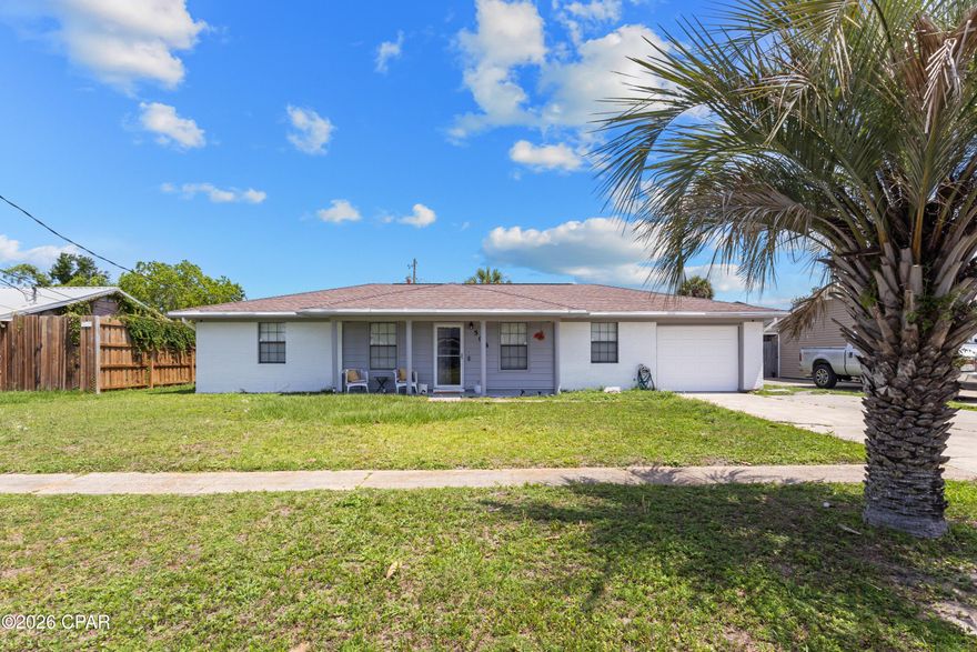 Affordable and conveniently located, this well-maintained 3-bedroom, 2-bath home offers over 1,300 square feet of comfortable living space and a spacious fenced backyard perfect for relaxing, pets, or entertaining. Located just off Highway 77 near Mosley High School, you'll enjoy quick access to shopping, dining, parks, and all the growing amenities Lynn Haven has to offer.

Inside, the home features a bright and open living and dining area, along with a generously sized kitchen and breakfast nook that can easily serve as a flex space, office area, or additional seating. The primary bedroom includes a private bath with a newly updated walk-in shower, while two guest bedrooms share a conveniently located hall bath.

The deep single-car garage provides excellent storage and includes the indoor laundry area. Outdoor enthusiasts will appreciate being just minutes from Cain Griffin Park, Sharon Sheffield Park, and the Lynn Haven Sports Park. Additional highlights include Flood Zone X and an HVAC system replaced in 2022.