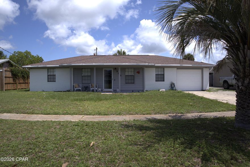 Affordable and conveniently located, this well-maintained 3-bedroom, 2-bath home offers over 1,300 square feet of comfortable living space and a spacious fenced backyard perfect for relaxing, pets, or entertaining. Located just off Highway 77 near Mosley High School, you'll enjoy quick access to shopping, dining, parks, and all the growing amenities Lynn Haven has to offer.

Inside, the home features a bright and open living and dining area, along with a generously sized kitchen and breakfast nook that can easily serve as a flex space, office area, or additional seating. The primary bedroom includes a private bath with a newly updated walk-in shower, while two guest bedrooms share a conveniently located hall bath.

The deep single-car garage provides excellent storage and includes the indoor laundry area. Outdoor enthusiasts will appreciate being just minutes from Cain Griffin Park, Sharon Sheffield Park, and the Lynn Haven Sports Park. Additional highlights include Flood Zone X and an HVAC system replaced in 2022.