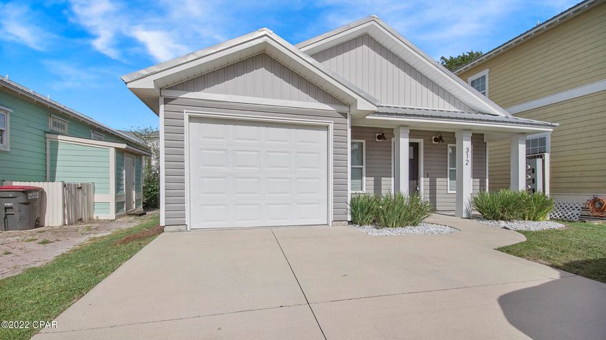 Close to Tyndall AFB and affordable.  Home has custom cabinets, quartz counter tops, new vinyl plank wood looking floors, carpet in bed rooms, upgraded light fixtures, metal roof, new siding and attic insulation. Home has new whole house water filtration system.  Neighborhood offers paver street and driveways, Park areas, Playground and Basket ball court.