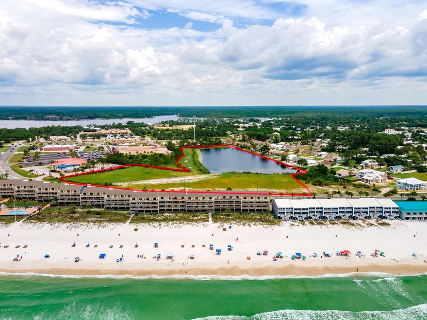 SELLER FINANCING WITH 15%-20% DOWN, 6% INTEREST RATE, 30 YEAR AMORTIZATION, 3-5 YEAR BALLOON** TAX RECORDS ARE WRONG. IT'S APPROXIMATELY 5.5 ACRES OF CONTIGUOUS LAND ON THE WEST END OF PCB. PART OF THE ACREAGE IS 3/4 OF JAMAICAN LAKE*** Currently zoned 15 units per acre but city has stated they will allow for more units per acre. Gulf views from Front Beach Road and lake views from the back. Just around the corner from two major grocery stores(Publix and Winn Dixie), Carillon Beach, and a few minutes from Rosemary Beach and scenic 30A. Zoned commercial and residential. New home/townhome subdivision, retail center. Build a mixed use residential/commercial subdivision...the possibilities are endless.