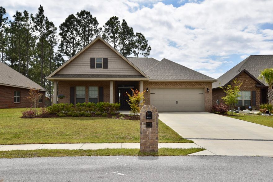 Beautiful - LIKE NEW 3/2! Centrally located to Tyndall AFB and the Naval Support Activity. Cherokee Heights is a desirable neighborhood in Bay County with its natural flair, close to shopping and some of the best schools. This home features 1,864 sq ft with gorgeous granite countertops, stainless steel appliances, and crown molding. As you enter the home, you can't help to notice the large foyer covered by a tray ceiling wrapped in crown molding.  Walk into the great room, and again, you are surrounded by a spacious living room, covered by a DOUBLE tray ceiling. The main bath highlights a gorgeous double vanity, garden tub, and separate shower. Its open floor plan and charming accents can be felt throughout. The privacy fence provides safety and security for your children or pets, while the covered porch offers plenty of space to relax and grill. This is an absolutely stunning all brick home, kept up beautifully, ready for your family. Call for your private tour! Measurements/sizes are approximate, buyer to verify if important.