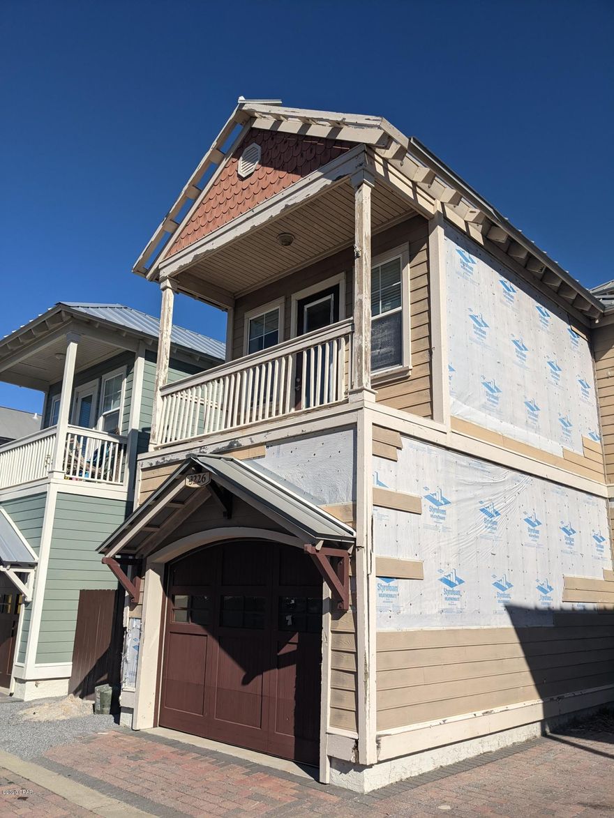Great Investment Opportunity! This 3 Bedroom 2 1/2 Bath home sits in the wonderful Community of Waterside Village in Mexico Beach. This unit offers Gulf Views and is approximately 800 feet from the White, Sandy Beaches. Don't miss your chance at this rare fixer upper opportunity!