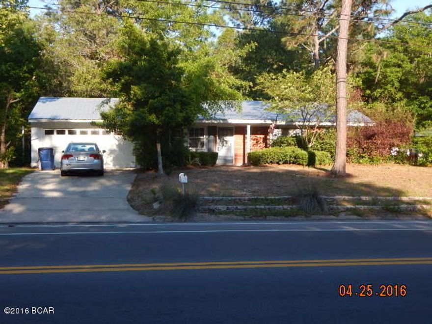 Updated & well-maintained 3-bedroom, 2-bath home in desirable Forest Park location.  Glass-sliding doors open from the kitchen to a beautiful arbor-covered brick patio overlooking the fenced back yard, which includes a small yard building for storage. There is an irrigation well for the sprinkler system; it just needs a new pump. The owner installed a new metal roof within the last 2 years and converted the garage into a heated-and-cooled bonus room! Also, there is tile & laminate throughout for easy maintenance. Property being sold as is.  Measurements approximate, please verify if important.
