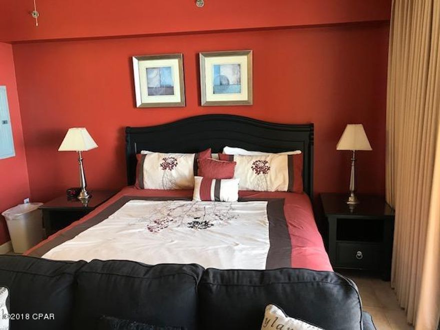 Pristine Condition! Beautifully Furnished and rental ready. It has been freshly painted, new air conditioner, new hot water heater and new sleeper sofa. These studio condos can be really great rentals (this one grossed $17,300last year). The studio condos in Shores of Panama have full kitchens, including a full size fridge, a stove and oven, a dishwasher and microwave. They also have washer/dryer.

The complex has the largest lagoon pool on the beach, along with an indoor pool, hot tub, gym and bar and grill.