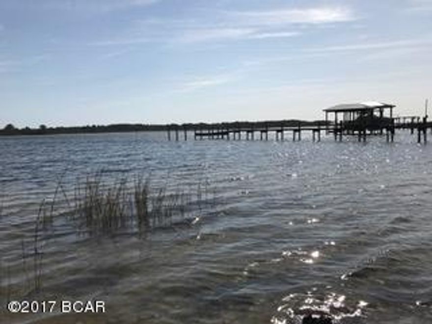 **MOTIVATED SELLER** MAKE AN OFFER!!! Beautiful Bay-front lot in exclusive new Northshore subdivision.  Property is cleared and underground utilities are in place.  Beautiful sunset views on a deep water lot.  Build your waterfront dream!