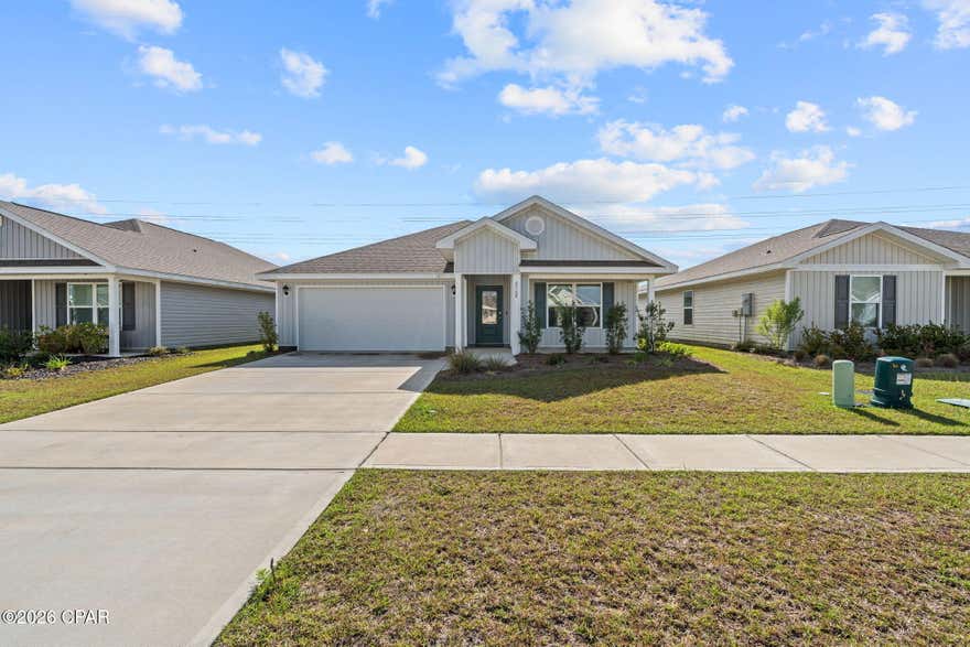 Welcome to the beautiful, expansive, amenity filled community of Liberty. This gorgeous ''Cali'' floorplan is 4 bedrooms 2 bathrooms, fenced backyard and over 1800 sqft of seamless, open living space!! Traditional 8' ceilings. Engineered Vinyl Plank flooring in all common areas of the home and carpet in bedrooms. Stainless steel appliances allow the white kitchen cabinets to truly pop!
Liberty neighborhood is conveniently located just off of Star Avenue near 231. Located just 25 minutes from Tyndall Airforce Base, 20 minutes to hospitals, and less than 15 minutes to shopping, restaurants, and grocery stores you will be amazed at the convenience once you enter the winding entrance to this beautiful sanctuary. Community center, offers a 7,500 square foot community center with full gym, wellness rooms and much more!!!