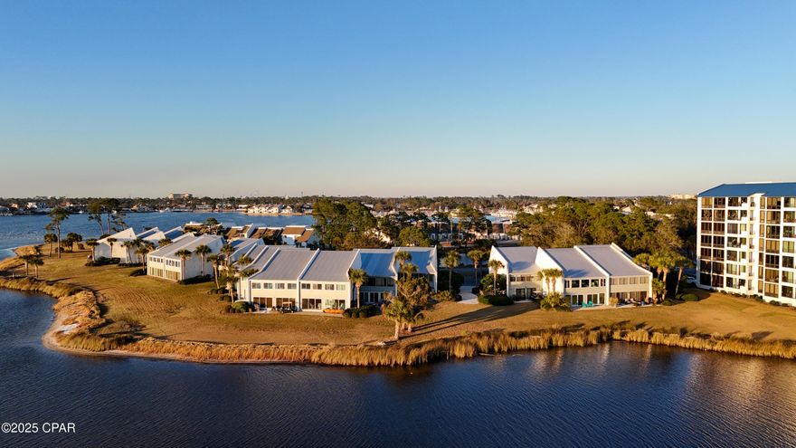 This completely renovated Bayview Villa is located in Bay Point and overlooks Grand Lagoon and St. Andrews State Park. Prior owner is a renowned Bay Point builder and upgraded the entire unit to an exacting standard. The nickel gap shiplap is found throughout with flush mount recessed lighting and slicked ceilings. The windows are floor to ceiling overlooking the bay and providing abundant light. Kitchen cabinets, counters, backsplash, and appliances have all been updated. Subway tiles are used in bath and kitchen. The units floor plan has been modified to provide a pantry and more efficient use of closet area. While there are NO rental restrictions, this unit has never been rented short term by current owner. Bayview consist of four buildings totaling 40 units. There is a community dock that allows owners to keep boats at the dock with temporary trailer parking. Bayview is financially sound and is not required to meet current statutes facing condos three stories and above. Even so the association is funded with healthy reserves. 400 a month condo fees is one of the lowest on the beach and in Bay Point. There are also golf cart parking on the sides of each building to keep carts. Point South Marina is around the corner for larger boats. Bay Point is a gated community with 24 hour roving security, an 18 hole Nicholas Golf Course, tennis courts, resort hotels, with several restaurants and bars.