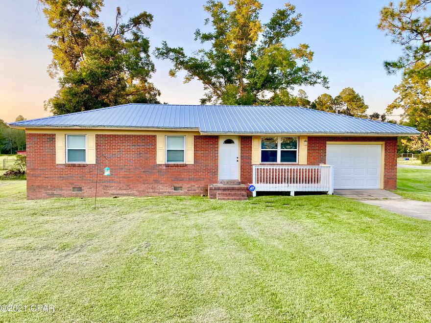 Cute brick home located just outside of the city limits of Chipley on over a 1/4 of an acre corner lot! This home features 3 bedrooms and 1.5 baths with an open floor plan. The master has an attached 1/2 bath. There are two storage sheds w/electricity behind the home with a covered patio area, an attached garage, and a small front porch. The roof is metal and only 3 years old! There is a usable survey on the property. Washer and dryer convey with the sale. Here there is a country feel, but you are still minutes away from all of the conveniences!