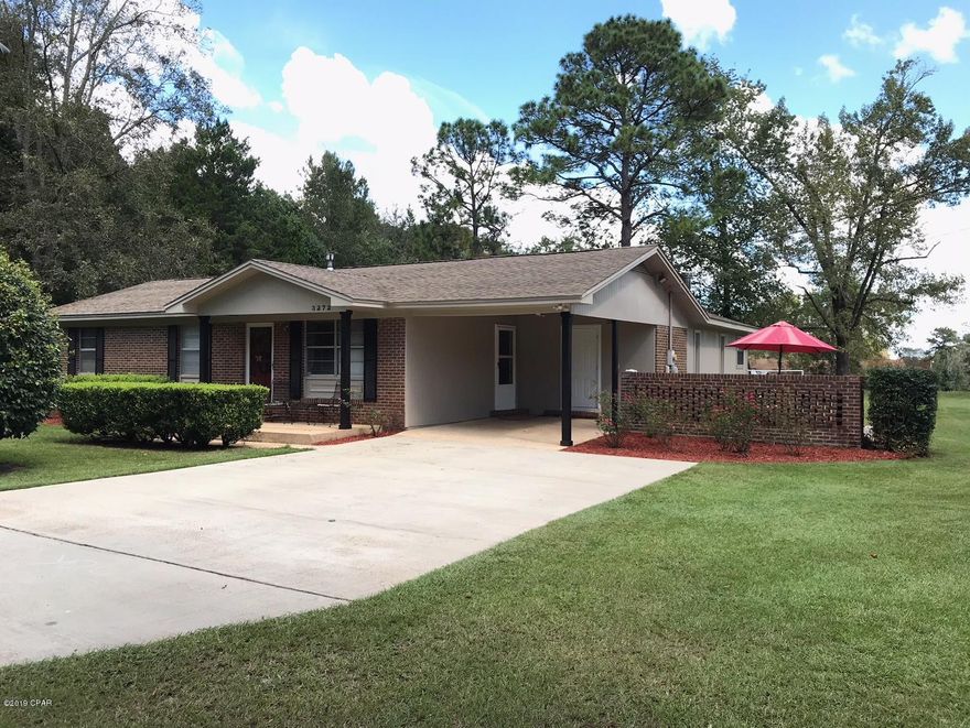 'CURRENTLY UNDER CONTRACT, SELLER ACCEPTING BACKUP OFFERS' Beautiful brick home in Dogwood Heights!  3 bedrooms, 2.5 baths.  Kitchen has new countertops & stainless appliances.  Large family room has a wood burning fireplace and a home theater system wired with 1080p HD ceiling projector and automatic ceiling screen.  Brand new AC & heat pump.  Brand new roof.  New floor covering.  New interior & exterior paint.  20' x 24' workshop/storage with power & a loft.  10' x 20' double dog kennel with concrete floor.  Chain link fenced backyard.  Nice patio.  Home is located minutes from the site of the new K-8 school, Marianna High School and the MERE recreational complex.  Call today to see this home!