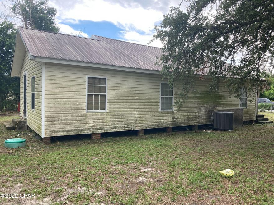 Excellent investor or handyperson fixer special! Not far from glory with some easy cosmetic work and you have a winner! Roof is good, Ac works! Large almost 1/3 acre to park your toys and buffer yourself. Priced to sell as is.