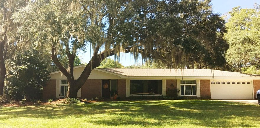 **BACK ON THE MARKET** 4br/2ba spacious home in desirable Kings Point/Pretty Bayou area. This home shows true pride of ownership from the landscaped yard, to the inviting interior. Spacious living room includes a wood-burning fireplace, Bose surround sound speakers, recessed lighting, & sliding doors that lead out to a large, covered back porch & paver-stone patio. Kitchen has NEW Kitchenaid stainless steel appliances, GRANITE countertops, & an oversized breakfast bar. Master has a huge walk-in closet. Master bath has been remodeled and has double vanity w/ a titled shower. Home sits on corner lot surrounded by mature oak trees in a friendly neighborhood w/a park near by. Conveniently located to the Mall/23rd St & the Navy Base/PCB. Home remodeled in 2008 & new roof added in 2012. Seller is having the large front window replaced.