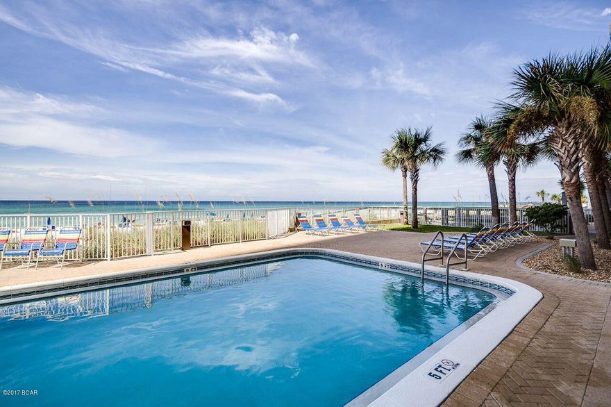 Check out the breathtaking view from this over sized balcony which is found in this desirable condo unit at Ocean Reef. The amazing gulf view can be enjoyed in the living area or the master bedroom.   As you walk into this condo, you will feel as you have escaped to the beach.  This condo features  upscale decor along with a kitchen that features wood cabinets, granite counter tops, large bar with four bar chairs. and tile back splash. The master bedroom offers a king size bed, the second bedroom offers a queen bed, the sofa converts to a queen sleeper and 1 cot is available.  There are three flat screen TVs and a Blue-ray DVD player for your enjoyment.

This condo will catch your attention with the designer furniture.  There is no detail left to chance.  Condo is located on the popular west end of Panama City Beach and approximately one mile from Pier Par, a shopping, dining and entertainment hot spot.  This beach front resort offers a private beach, a gulf front 20 x 80 swimming pool and a heated indoor pool, a grill area, hot tub, steam and sauna room, fitness room, a meeting room with internet and more.  This unit comes with a ground floor assigned parking space across from  the elevator. Call today to see what this condo has to offer you and your family.  All information contained herein is believed to be accurate and true however the buyer assumes complete responsibility of verification of all information.