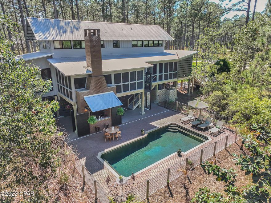 **Entered for Comp Purposes Only**

Southern Living House in the exclusive, gated community of RiverCamps. Attention to details and craftsmanship is demonstrated throughout this incredible home. Located on .99 acres this home overlooks a pond, has it's own inground pool, cargo-lift and over 800 square feet of screened in porches. Truly a one of a kind home located in the highly sought after gated community of RiverCamps,
a 1500 acre outdoor enthusiasts dream. Located on 3 bodies of water, West Bay, IntraCoastal Waterway and Crooked Creek, RiverCamps will have less than 450 homes spread amongst 1500 acres ensuring you peace and serenity yet only 10 miles from the white sandy beaches and the shopping at Pier Park.
Listing/Selling agent is the onsite Realtor and Community Specialist.