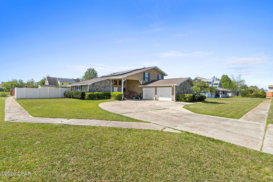 The home's location is perfect for the young family active in the community, close to schools,
church, shopping and medical facilities. Located in the highly desirable Forest Park East neighborhood. This spacious home offers four bedrooms and three baths with one bedroom downstairs and three upstairs with two full baths. This home features a galley kitchen and two living spaces. The main living area has a wood burning fireplace. for those cool nights. Enjoy the large screened porch, great for entertaining or just relaxing. Privacy fencing around the back yard. Has a large side yard if you have a boat or other toy that needs a place. Home sits on a large corner lot. Call a Realtor today to schedule your private showing.