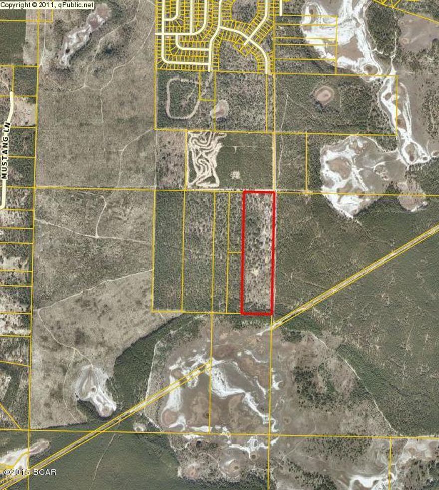40 acres of land adjoining the NW Florida Water Management property. Live secluded and only 30 minutes from Panama City.  Great opportunity for hunting.  It's hard to find acreage priced this well in the area.