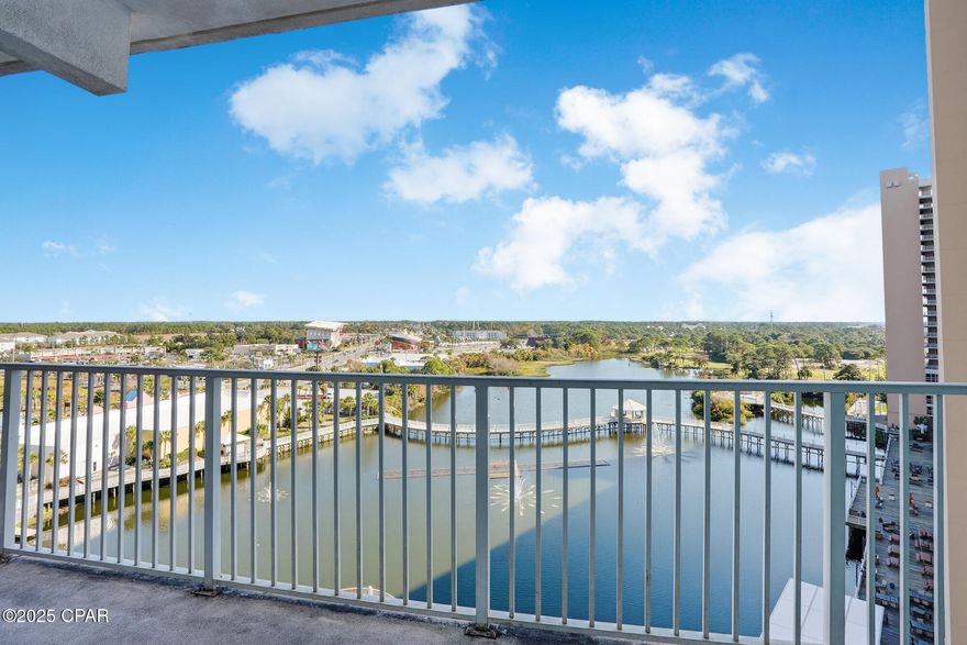 Come tour this spacious Lakeview 2BR/2BA condo—PLUS a private bunk area that functions like a third bedroom! Located at the popular Laketown Wharf Resort, you'll be in the heart of all the fun and excitement of Panama City Beach, just steps from the world-famous white-sand beaches, shopping, dining, and entertainment. This wonderful condo sits on the lakeside of the building, offering peaceful daytime views and sparkling city lights at night. Inside, you'll find new kitchen appliances, a stylish tile backsplash, and a combination of ceramic tile and luxury vinyl plank flooring throughout. The extra-large balcony is accessible directly from the master bedroom—perfect for morning coffee or evening relaxation. At Laketown Wharf, you're surrounded by amenities designed for the entire family, including: Beach access directly across the street, Five distinctive pools, 810 Billiards & Bowling, Kids Funscape playground, Splash Bar & Grill, Gulf-view fitness center, covered garage parking and A 52,000 sq. ft. lakefront boardwalk featuring shops and dining. You're also just a short drive to Pier Park, Topgolf, and the newly opened Dolly Parton's Pirate Theater. Whether you're seeking a vacation escape, a strong rental investment, or a full-time coastal home, this condo is your opportunity to own a piece of paradise. Schedule your private showing today! Buyer to Verify All Information Deemed Important.
