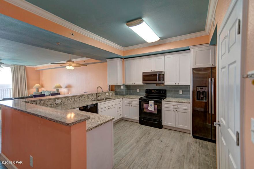 Welcome to Tidewater 2505, one of the largest 2-bedroom / 2 bath floor plans on the beach.  1593 sq. ft. of living space that sleeps 8, with incredible views of the Gulf from your living room and master bedroom, both with balcony access. This never rented unit is perfect as a primary residence, a second home, or as an investment property. Similar units are renting for $43,000+ a year. Open concept with 9 ft ceilings, this unit includes a new kitchen with granite counter tops and upgraded appliances, new ceramic tile flooring throughout, new Samsung washer and dryer and a new hot water heater! This unit also includes 2 storage areas that are deeded to this unit! Tidewater Beach Resort is a premier property and its close proximity to Pier Park and the airport make it everyone's first choice! Amenities include outdoor and indoor pools, well equipped fitness room, sauna, movie theatre, arcade room, coffee bar, BBQ area, large covered parking garage and over 600' of beachfront.