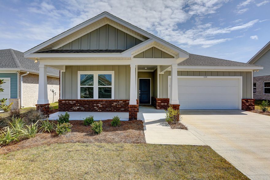 NEW CONSTRUCTION, CAMRYN'S CROSSING II subdivision in Lynn Haven built by Southern Coastal Homes. Interior features if the 4 bedroom home include a large living room that is open to the kitchen and dining area. Kitchen has a large center island, subway tile backsplash, and stainless appliances. French doors lead from the Great room to the large covered patio. Master suite has tray ceiling, double vanity, garden tub, and walk-in closet. This home includes features of the DESIGN BOARD shown in the photos. Cam II offers walking park & playground.



EXTERIOR - This all brick home has a 2-car garage, large covered lanai, covered front porch, fully sodded yard with Rain Bird sprinkler system.