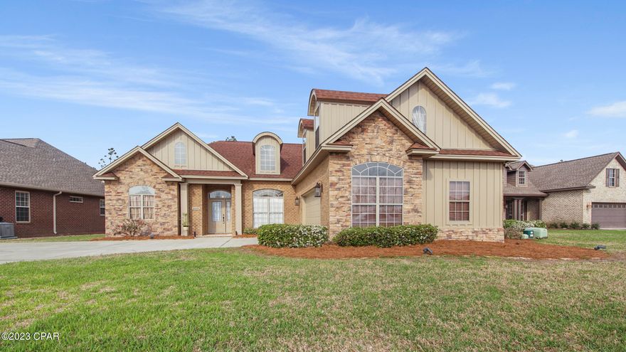 CURRENTLY UNDER CONTRACT, SELLER WILL CONSIDER BACKUP OFFERS' Amazing opportunity to own a custom-built home in desirable Hawks Landing.  Centrally located in the city of Lynn Haven jurisdiction. Spacious split bedroom floorplan with 10 ft ceilings throughout. Natural light from every direction. Large eat In kitchen with separate dining room. Plenty of cabinets, pull out drawers, granite countertops, island with cook top, breakfast bar/serving bar. Massive master bedroom with 1 walk in closet and 2nd closet. Double vanity in master bath with jazuzzi tub and separate walk-in tiled shower. 2nd floor offers bedroom and 1/2 bath. Screened in back porch. Sprinkler system that uses reclaimed water.  This is a must-see home that could be sold furnished.!