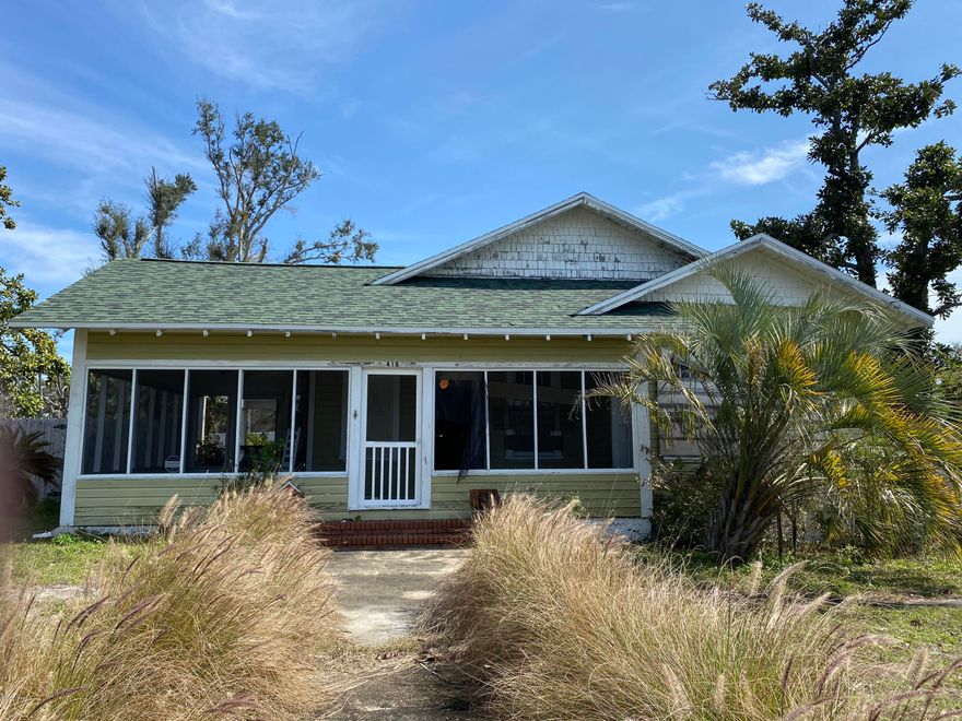 Nostalgic Old Florida Home. If you have a wistful affection for the past you'll love this historical home that sits on a corner double lot on Massalina Drive. Open views of the bayou and centrally located to historical Downtown Panama City. Charming 10 foot high ceilings, hardwood pine plank flooring, fireplace, custom interior columns and huge covered porches. Home is in need of repairs due to damage by Hurricane Michael. Prior to the hurricane renovations included a new roof, new electrical and plumbing, water heater and irrigation system. This home is being offered AS-IS.

(Buyer To Verify All Information Deemed Important Including: Square Footage, Lot & Room Dimensions and Year Built)