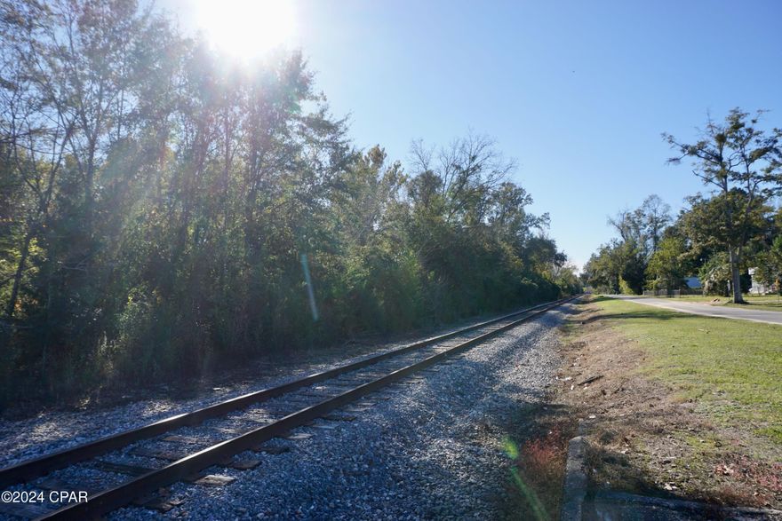 Nearly 6 acres of vacant land available in convenient location.  Currently zoned for commercial use, this property is close to downtown Sneads and convenient to I-10. With frontage on three roads, this property is easy to access and obtain public utilities.