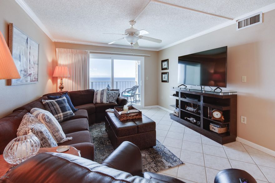 CURRENTLY UNDER CONTRACT, SELLER ACCEPTING BACKUP OFFERS. This beautiful 2BR/2BA gulf front condominium has been refreshed with a new kitchen, flooring, ceiling fans and more. HVAC and appliances have been updated recently as well. It is high enough to get away from the pool noise but low enough to still offer great views of the gulf AND beach. Make an appointment to see this gorgeous unit today.