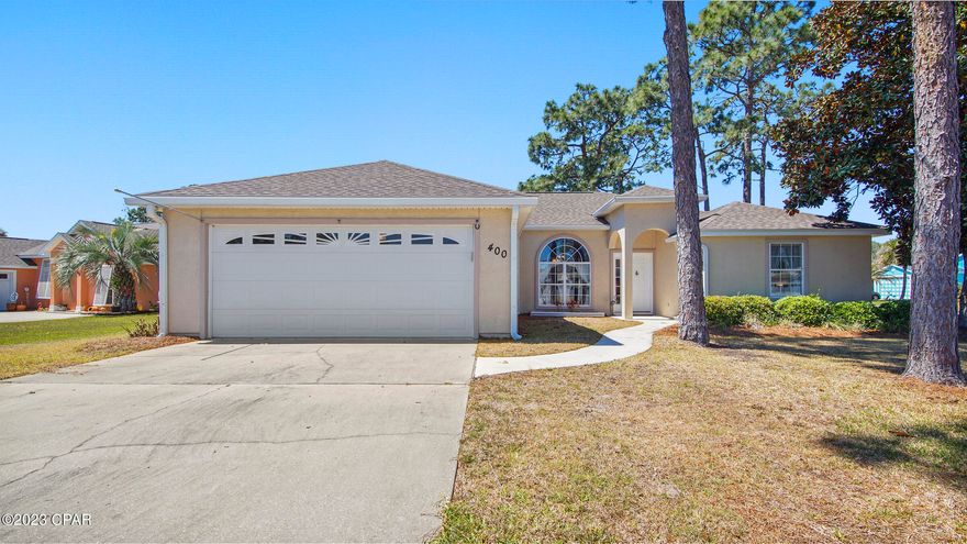 Check out the BEST PRICED POOL HOME in PCB. This 3 bedroom PLUS OFFICE, 2 bath home, with a split bedroom floor plan is located in the popular Hidden Pines Subdivision on the East End of PCB close to the Navy Base, and Brian Seltzer Park, with easy access to Thomas Drive and Front Beach Rd. The interior has a great semi open floor plan. The formal dining area and breakfast nook are open to the living room. The master bedroom is large and features an en suite bath complete with a jacuzzi tub, separate walk in shower, large walk in closet and double vanities. The office is separated from the other bedrooms making it great for anyone that works from home. The additional bedrooms have their own little hallway with a bathroom in between.  The exterior is ready for entertaining family and friends. Enjoy BBQ's and pool parties all summer long in the privacy of your own backyard with a nice size covered patio, and gas hook up for the grill. Call your Realtor TODAY to see this great home before its too late!