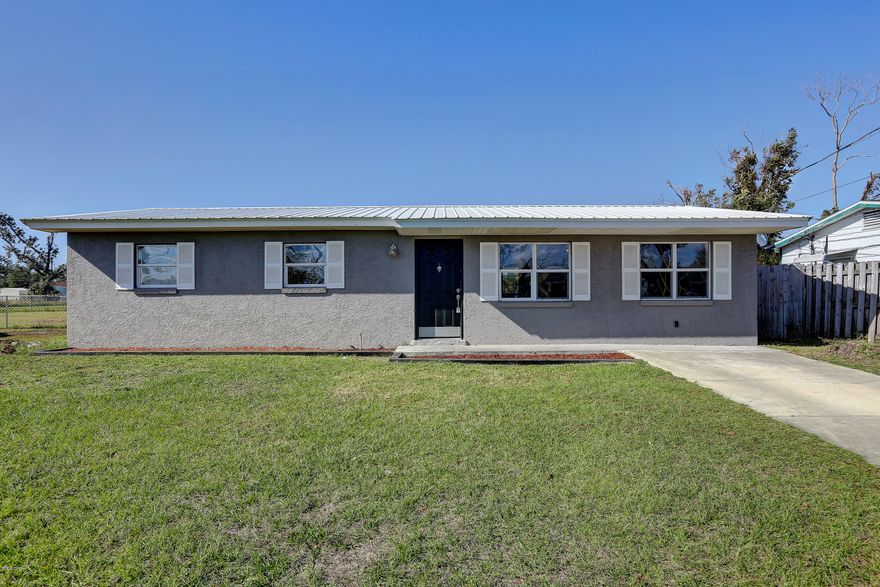 'CURRENTLY UNDER CONTRACT, SELLER ACCEPTING BACKUP OFFERS'  Move in ready updated home with a large yard.  This open floor plan 3 bedroom 1 bath home has vinyl plank flooring in the main living areas and carpeting in the bedrooms.  The kitchen has new cabinetry and countertops, and new refrigerator.  There is a stove, dishwasher and washer and dryer included.   There is a metal roof, laundry room and outdoor patio.  Come see it today!