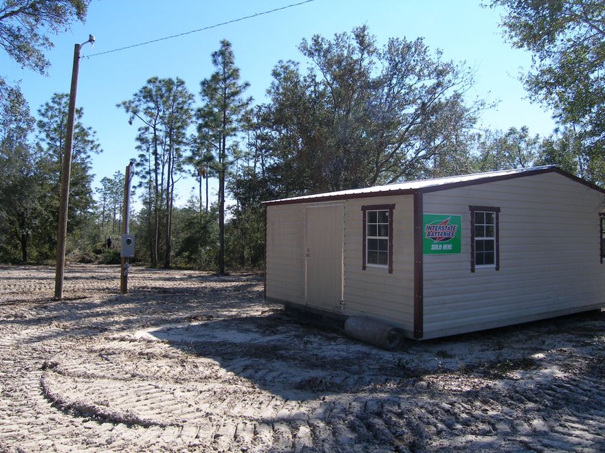 Vert nice cleared 1 acre parcel located on Hwy 77 with 115' of frontage. Will be located on new 4 line of Hwy 77 with a new driveway provided by the State of Florida. All cleared with power pole and 24 x 16 portable building located on the property. Formerly a ATV repair shop. Would be great for home and service business combo.