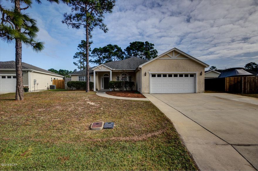 This three bedroom two bath home with office is move in ready. Gas fireplace is the focal point in the large living room with high ceilings. Split bedroom plan with french doors off the master onto the back porch. The large back yard has a 8' privacy fence. This is the least expensive house in the desirable neighborhood of Hidden Pines. Close to the Navy base and walking & bike trails.