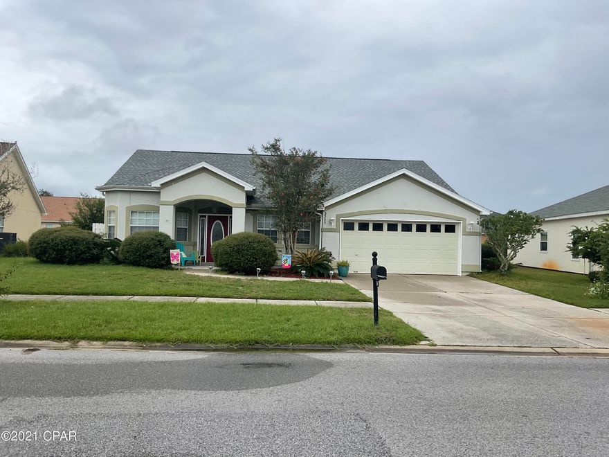 Welcome to the Hammocks one of the most sought after subdivisions in Bay County!  This home is centrally located in Lynn Haven convenient to schools, shopping, and entertainment. Walking distance to Mosley High School and Bay Haven Charter Academy. A community with sidewalks, a gorgeous community pool, and streetlights. The spacious living room has an electric fireplace and sliding glass doors that open to a covered patio and privacy fenced yard. Formal dining and breakfast nook. Tankless gas water heater. Master bedroom en-suite with double vanity, garden tub, water closet, and his and hers walk-in closets. master bedroom has private access to the back covered patio.  All measurements are approximate. Please verify if important.