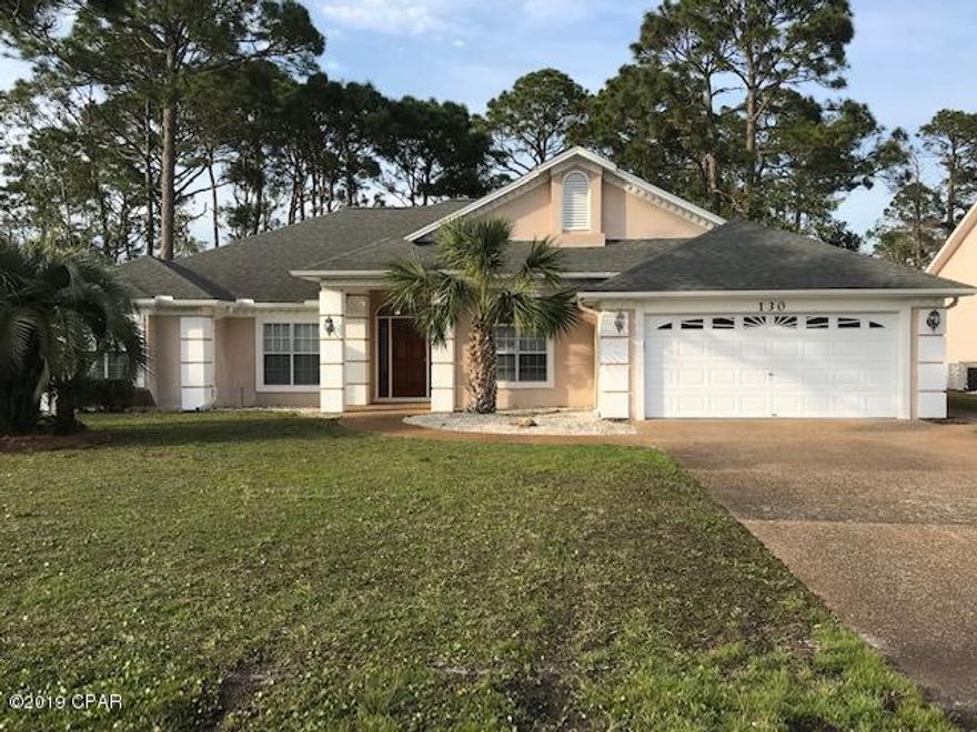 All this home needs is your creative touch to update! New roof with transferrable warranty! 3 spacious bedrooms, 2 baths, open-concept kitchen with breakfast area, formal dining room (could be an office), living room, hall and master BR. Master Bedroom has trey ceiling, door to patio, closets galore! Lovely Covered porch and patio overlook a wooded yard and lovely pond. Plenty of room in the backyard for a pool, too! Come see this great buy today!